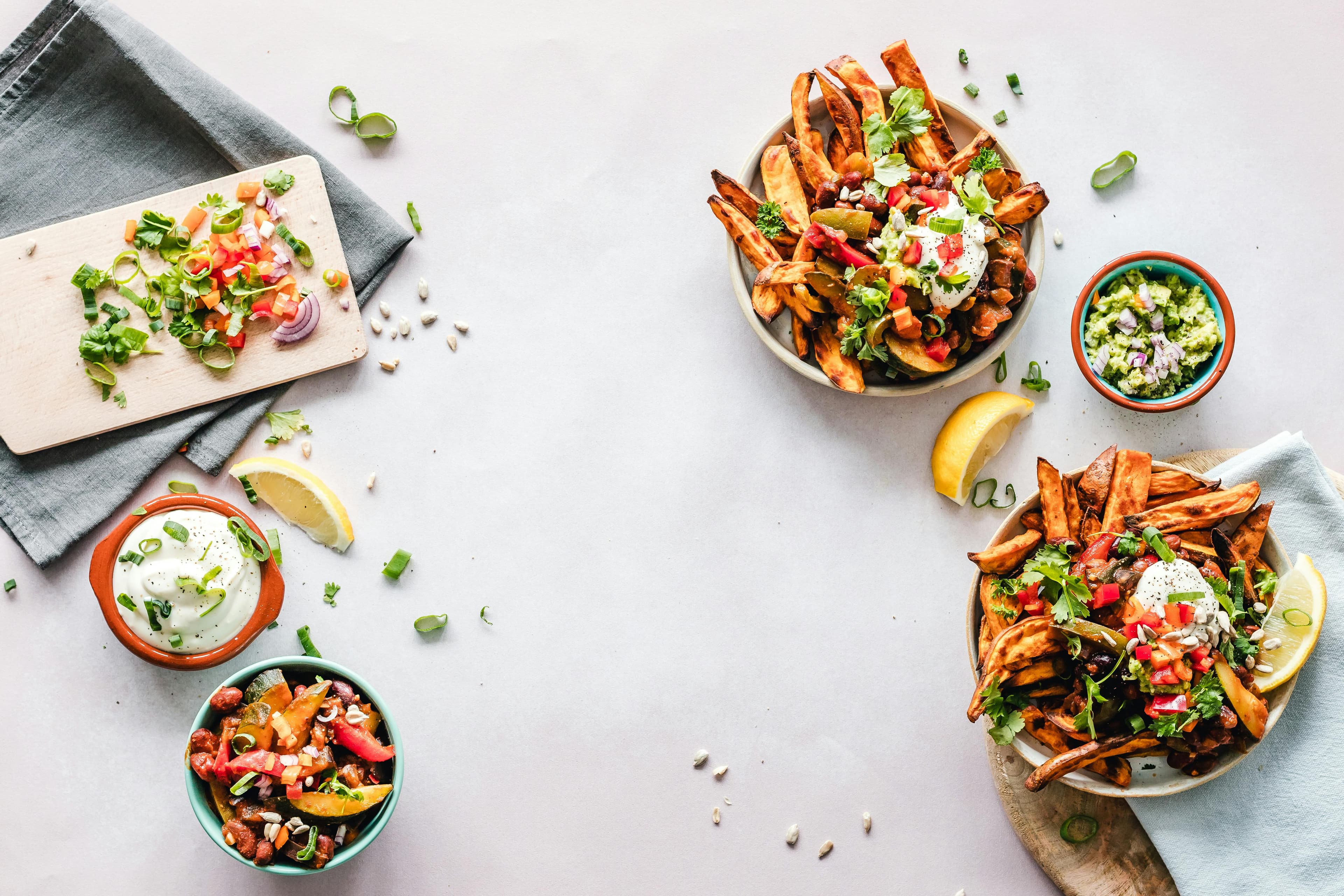 Colorful vegetable salad bowls on a table